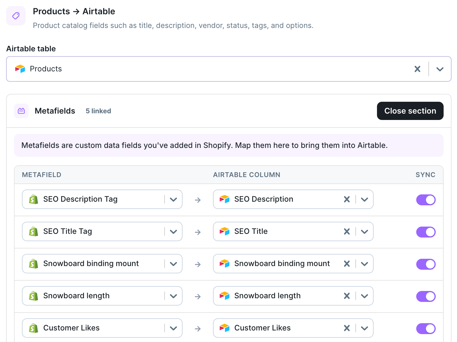 Metafields pane on the Products table mapping Shopify metafields to Airtable columns